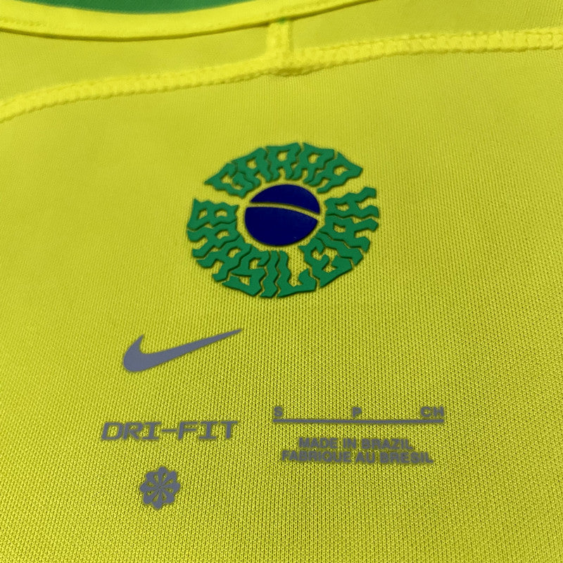 Camiseta local Brasil Mundial 22-23