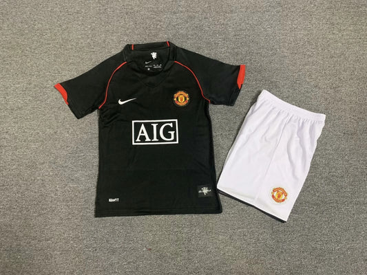 Kit niño visitante Manchester United 07/08